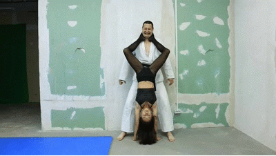 Tiffany demonstrates her gymnastics skills Tiffany demonstrates her gymnastics skills